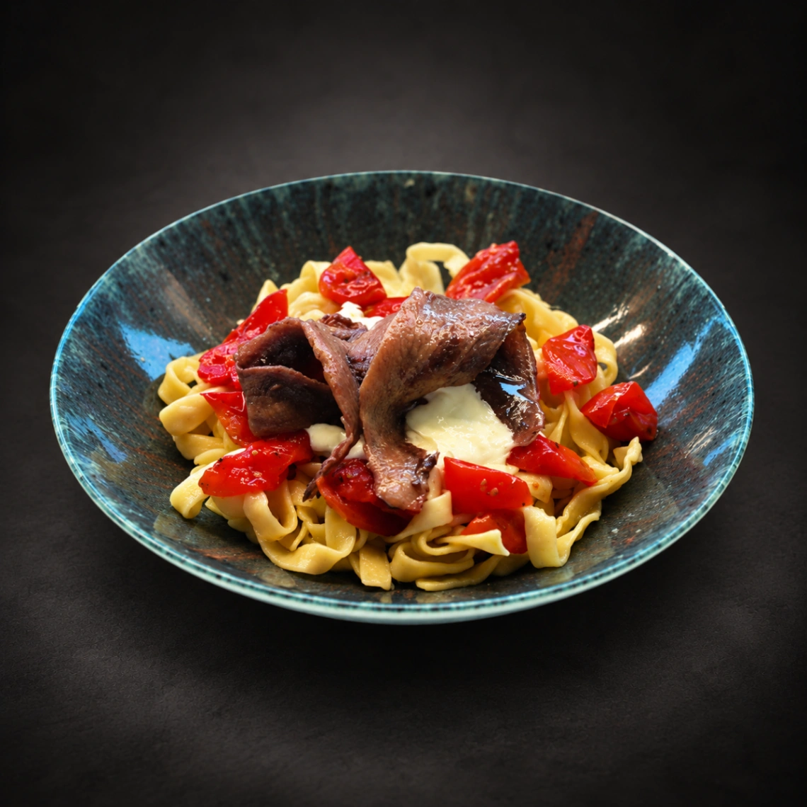 Tagliatelle con Burrata Pomodori Confit e Agone